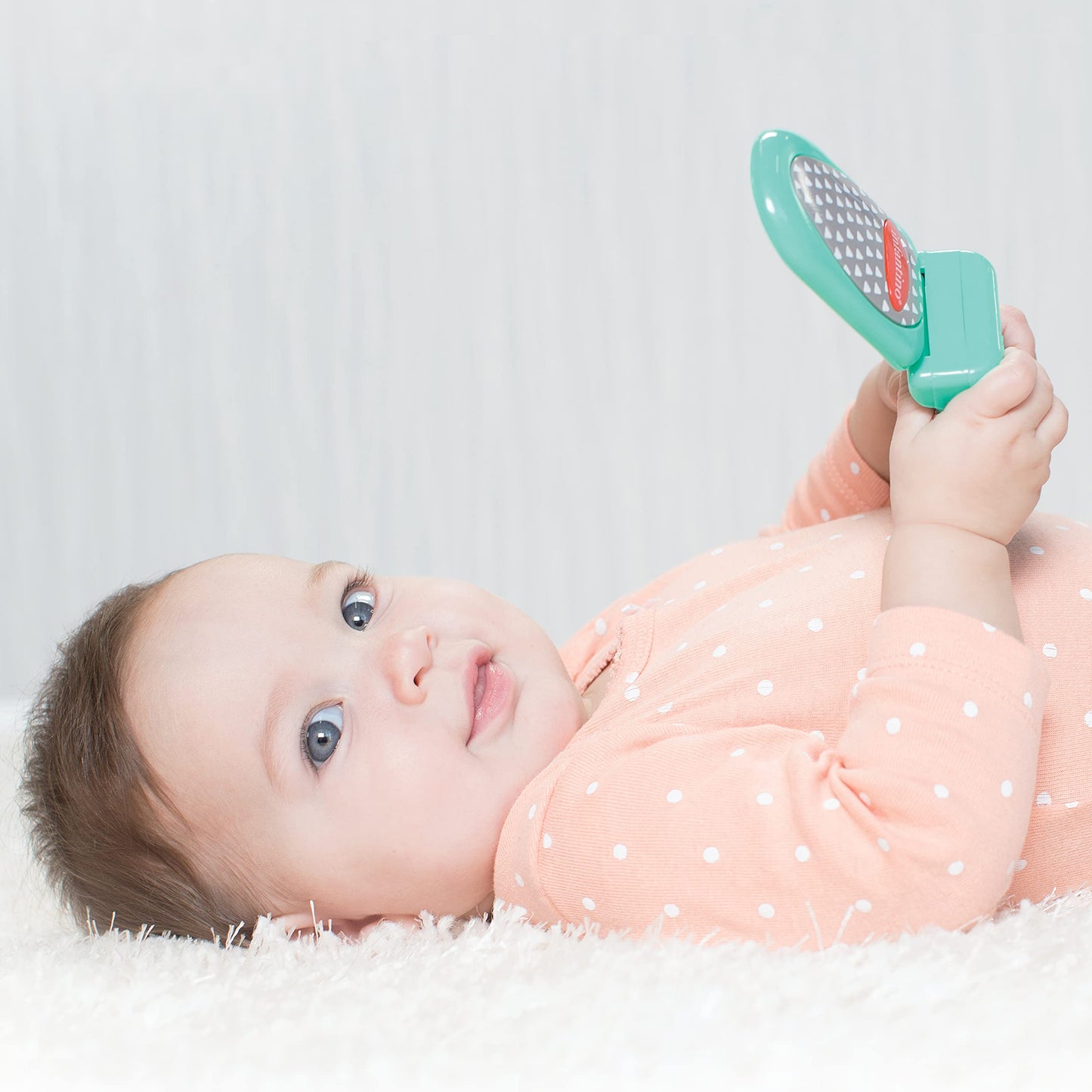 Infantino Flip and Peek Fun Phone: Bilingual with 3 English & 3 Spanish Phrases, Sounds Effects for Engagement, Peek a Boo Mirror Inside, 2 Colors, Ages 3 Months +