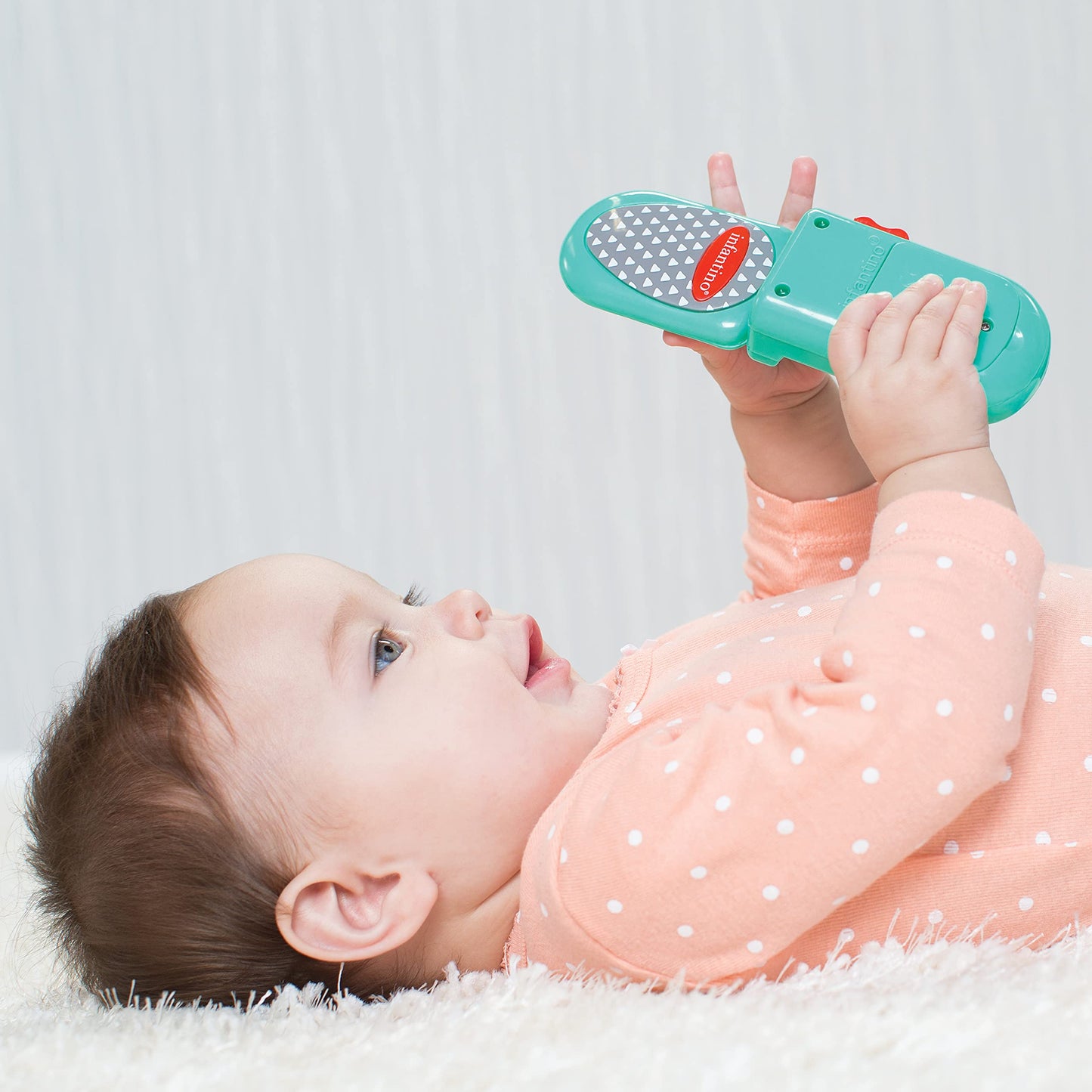 Infantino Flip and Peek Fun Phone: Bilingual with 3 English & 3 Spanish Phrases, Sounds Effects for Engagement, Peek a Boo Mirror Inside, 2 Colors, Ages 3 Months +